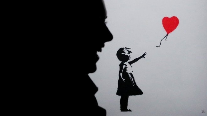 Banksy nin 1 milyon sterline satılan eseri kendini imha etti!