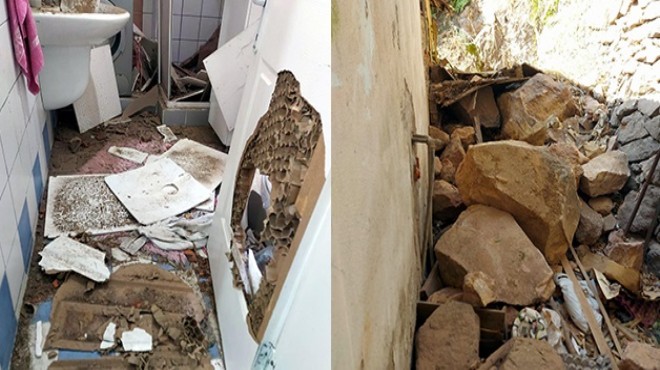İzmir de yamaçtan kopan kaya parçaları çatıyı delip eve girdi