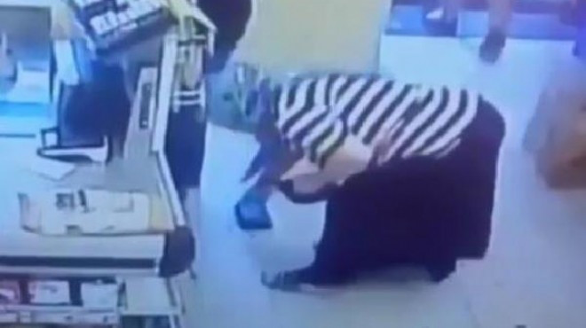 Markette düşen cüzdanı çalan kadın yakalandı