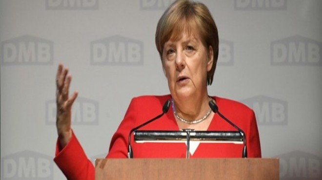 Merkel den kamu kurumlarına  güvenilirlik  uyarısı