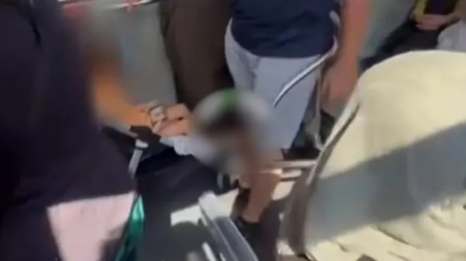 Belediye otobüsünde  Gavur İzmir  kavgası!