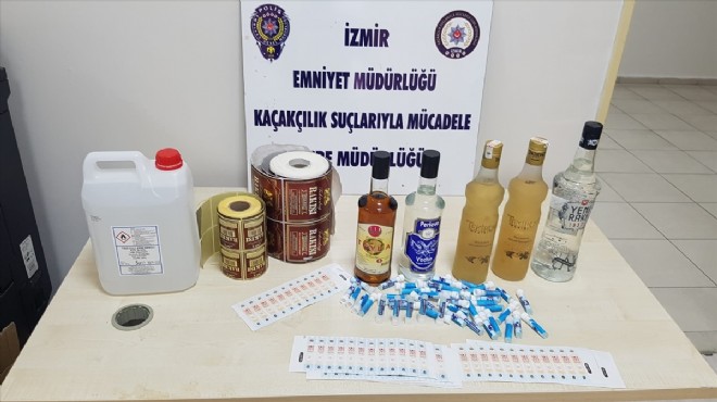 İzmir de 921 şişe sahte içki, 600 litre etil alkol ele geçirildi
