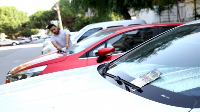Karşıyaka'da araçlara ilan bırakanlara ceza yağacak