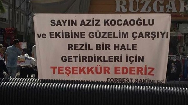 O ilçede Kocaoğlu'na pankartlı protesto!