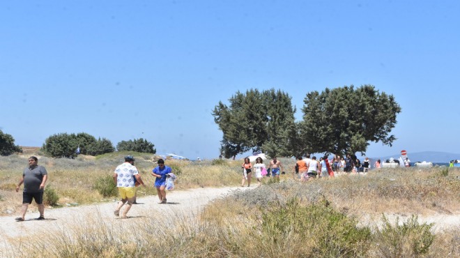 Tatilcilerin  plaja eşya taşıma  tepkisi