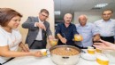 Başkan Tugay aşure bereketini paylaştı