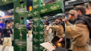 Bira kasalarıyla haç işareti yapan gençlere gözaltı!